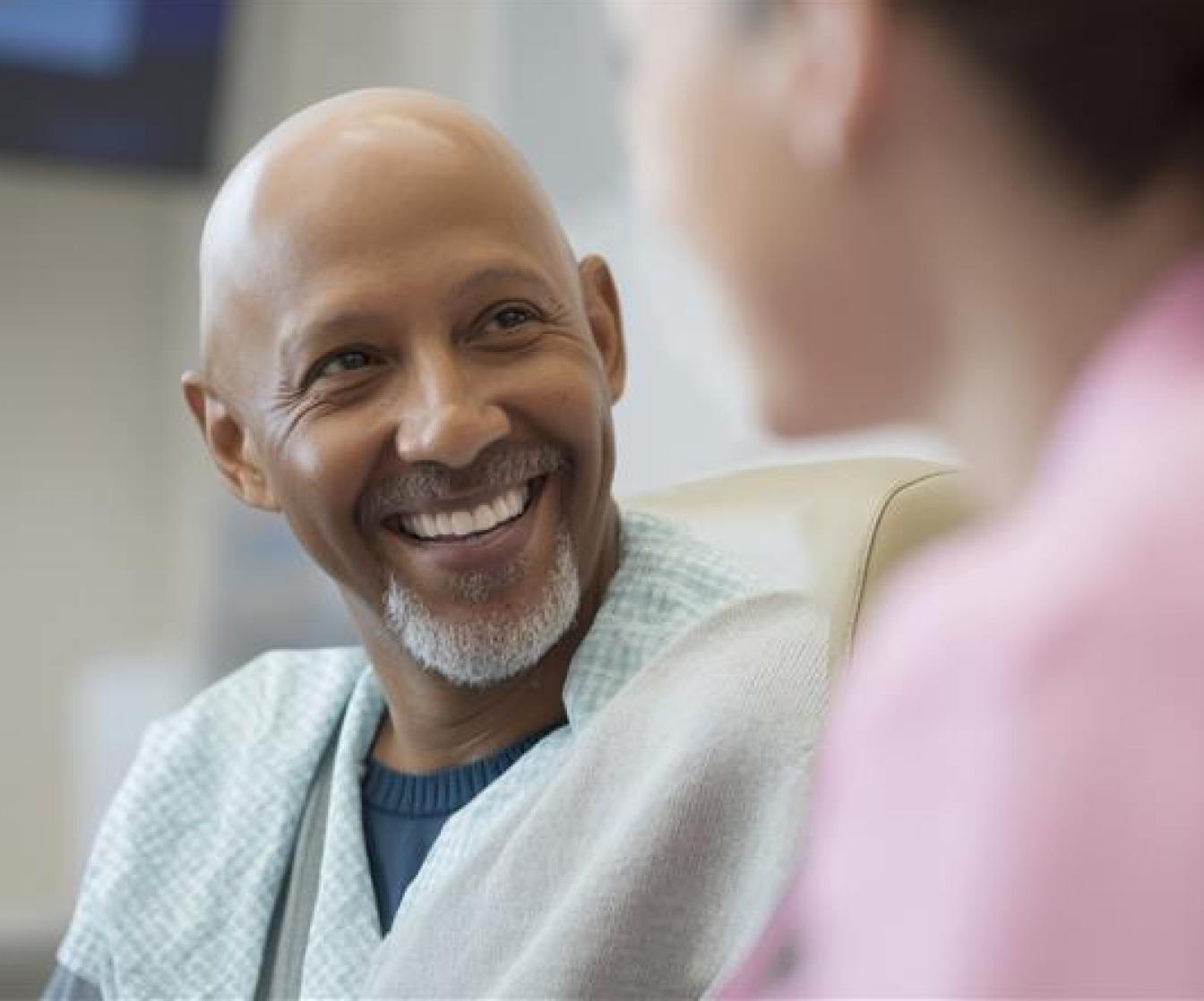 Doctor speaking with patient